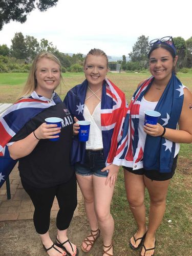 Programs - Girls in Australian Flag @Uluru | Professional Education Programs Abroad